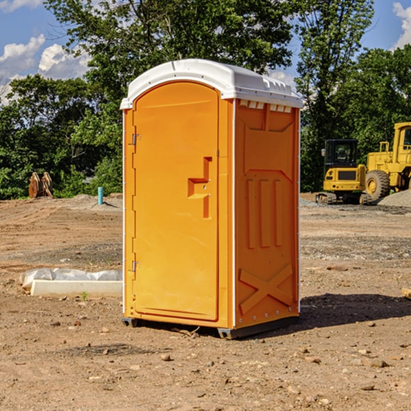 how often are the porta potties cleaned and serviced during a rental period in Jackson